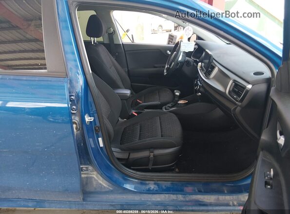 3KPA24AD4PE521182 2023 KIA RIO Blue Вид салону спереду