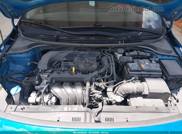 3KPA24AD4PE521182 2023 KIA RIO Blue Вид ззаду