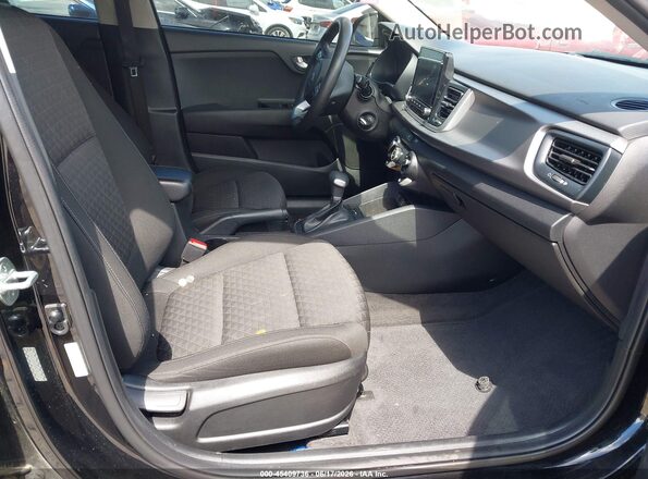 3KPA24AD6ME397136 2021 KIA RIO Black Front interior view