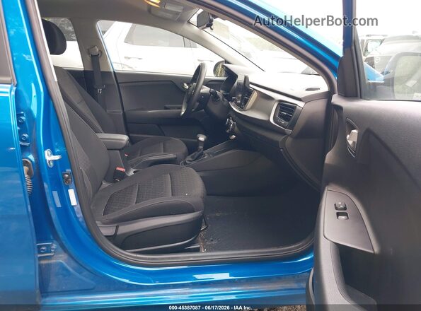 3KPA24AD6PE595333 2023 KIA RIO Blue Widok wnętrza z przodu
