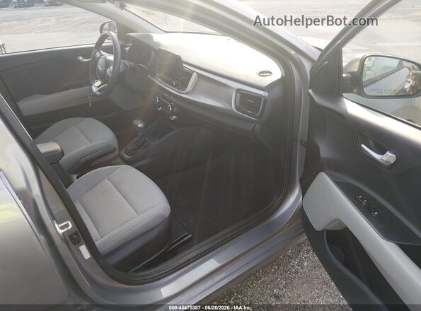 3KPA24AD8PE605926 2023 KIA RIO Silver Front interior view