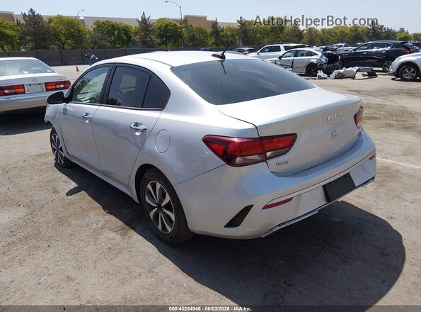 3KPA24AD9PE533733 2023 KIA RIO Silver Trasero izquierdo