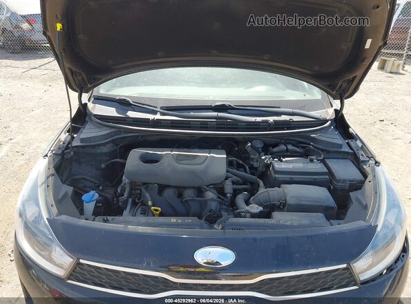 3KPA25AB8JE047345 2018 KIA RIO Black Rear view