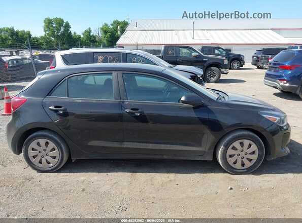 3KPA25AB8JE047345 2018 KIA RIO Black 360 interior view