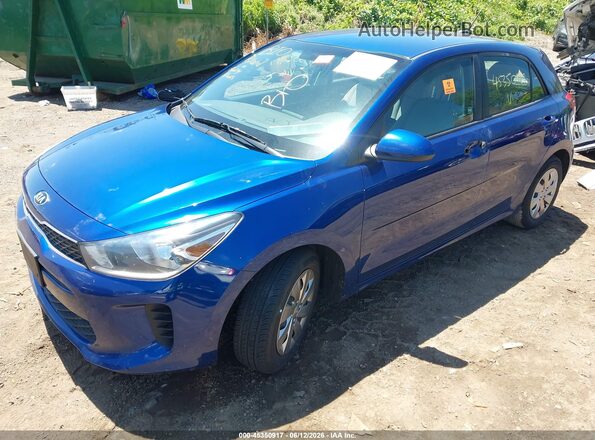 3KPA25ABXJE058217 2018 KIA RIO Blue წინა მარცხენა ხედი სამი მეოთხედიდან