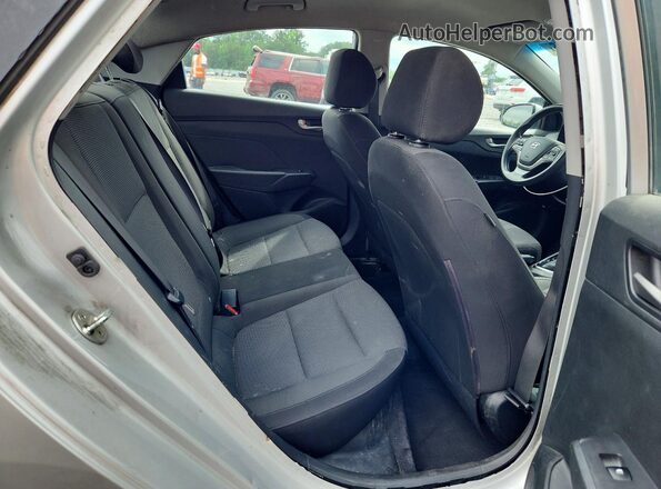 3KPC24A37JE025459 2018 HYUNDAI ACCENT Silver Rear seats view