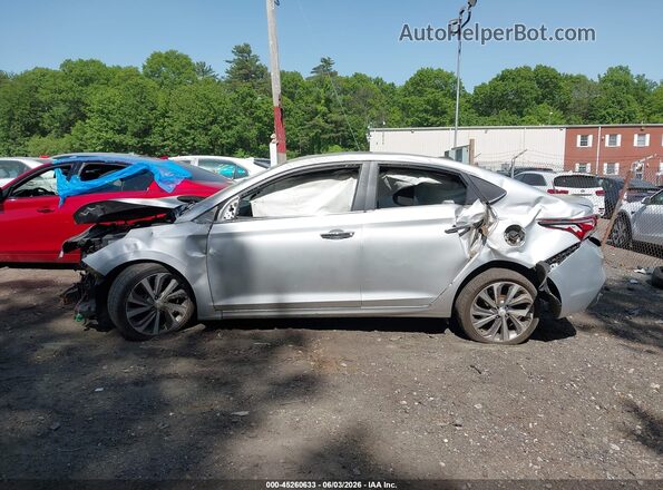 3KPC34A31KE054292 2019 HYUNDAI ACCENT Silver Սալոնի հետևի տեսք