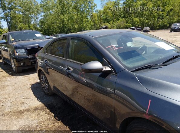 3KPF24AD0PE650137 2023 KIA FORTE Gray Vista interior trasera