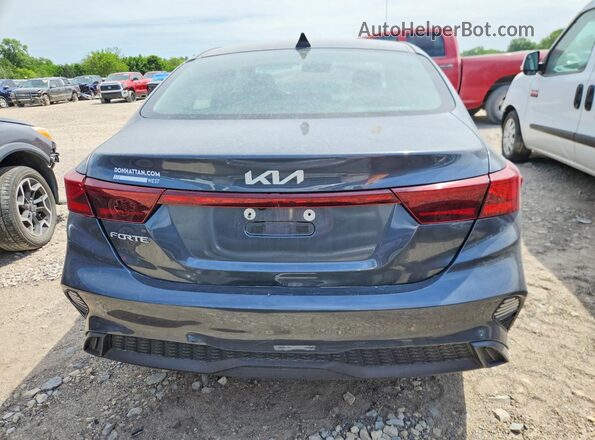 3KPF24AD0RE740326 2024 KIA FORTE Silver Rear view