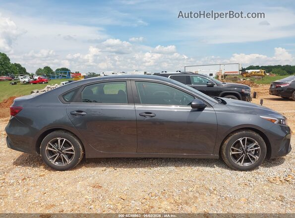 3KPF24AD1RE770631 2024 KIA FORTE Серый Вид задней части салона