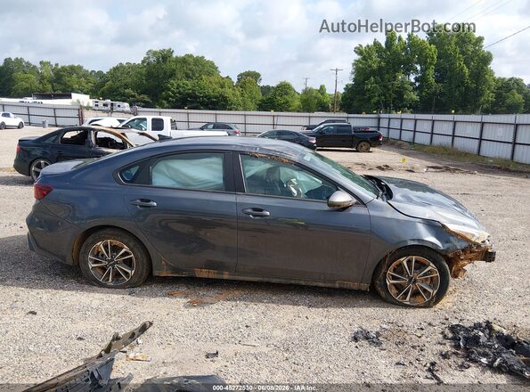 3KPF24AD2RE695874 2024 KIA FORTE Серый Вид задней части салона