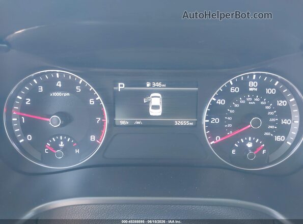 3KPF24AD2RE702032 2024 KIA FORTE White Vista de los asientos traseros