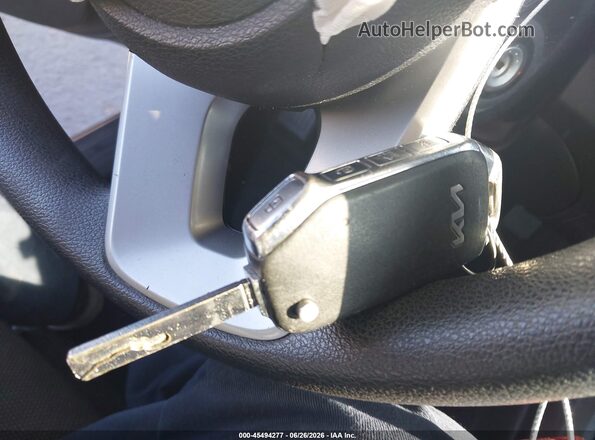 3KPF24AD2RE708963 2024 KIA FORTE Blue Dashboard view