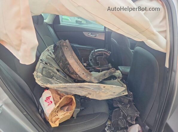 3KPF24AD3RE720085 2024 KIA FORTE Silver Rear seats view