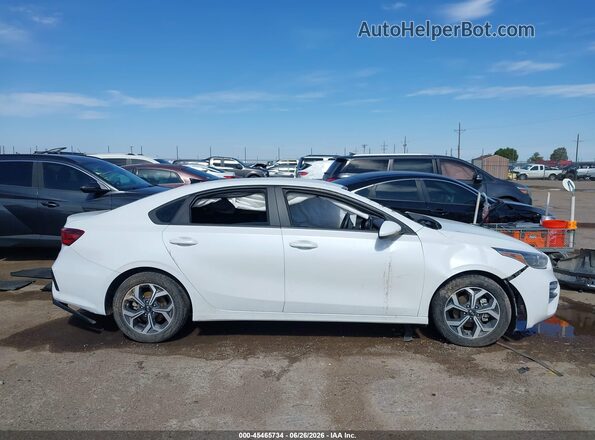 3KPF24AD5ME307402 2021 KIA FORTE Белый Вид задней части салона