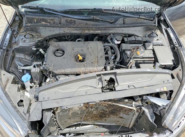 3KPF24AD5RE839756 2024 KIA FORTE Charcoal Rear interior view