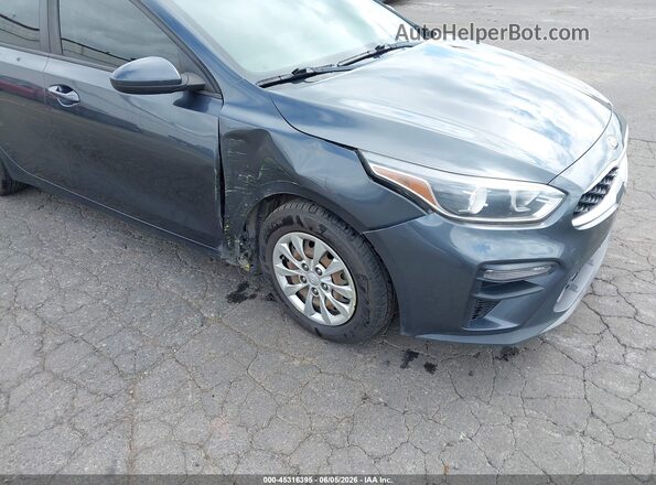 3KPF24AD7KE028224 2019 KIA FORTE Gray Front view