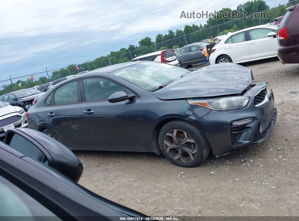 3KPF24AD7KE108879 2019 KIA FORTE Gray Rear interior view