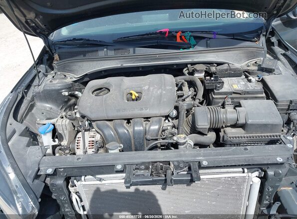 3KPF24AD7RE789832 2024 KIA FORTE Gray Widok z tyłu