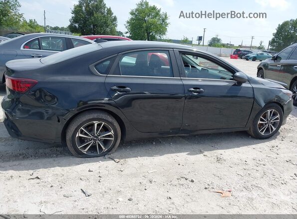 3KPF24AD7RE789832 2024 KIA FORTE Gray Widok wnętrza z tyłu