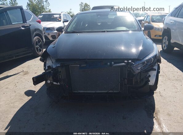 3KPF24AD7RE812218 2024 KIA FORTE Black Vista interior trasera