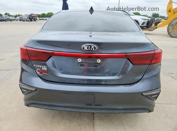 3KPF24AD8KE110592 2019 KIA FORTE Gray Rear view