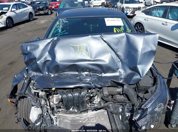 3KPF24AD8PE608749 2023 KIA FORTE Gray უკანა ხედი