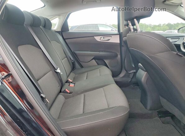 3KPF24AD8RE805682 2024 KIA FORTE Black Vista de los asientos traseros