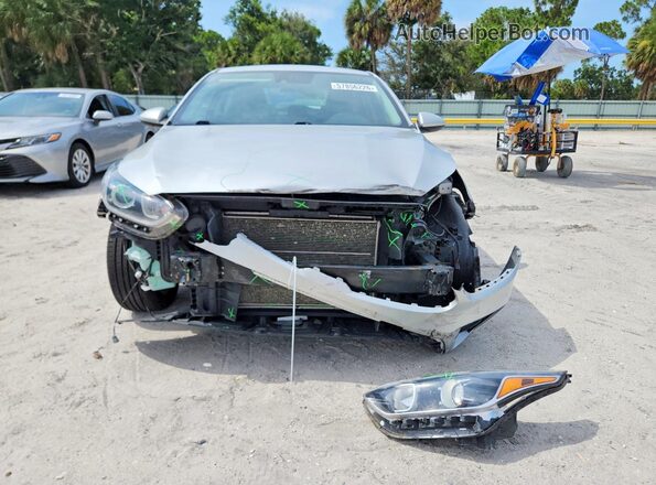 3KPF24AD9ME331976 2021 KIA FORTE Серебряный Вид спереди