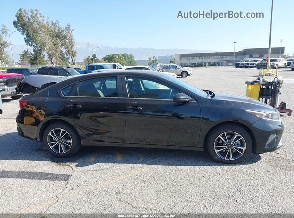 3KPF24AD9PE665560 2023 KIA FORTE Black Rear interior view