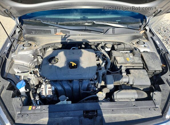 3KPF24AD9RE704683 2024 KIA FORTE Silver Вид задньої частини салону