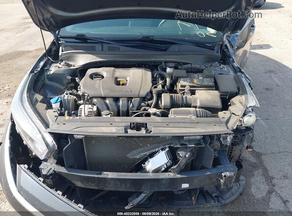 3KPF24AD9RE767329 2024 KIA FORTE Gray Vista trasera