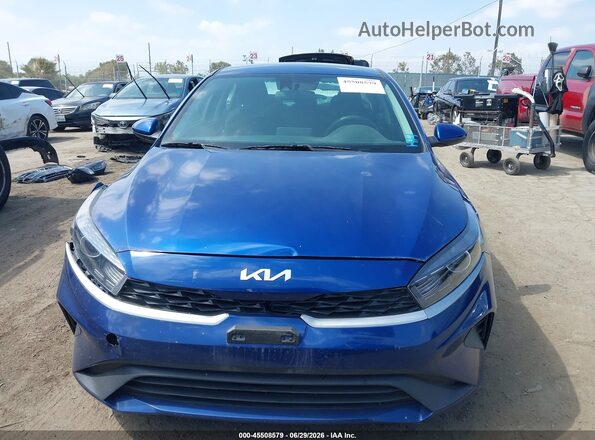 3KPF24AD9RE780145 2024 KIA FORTE Blue Dashboard view