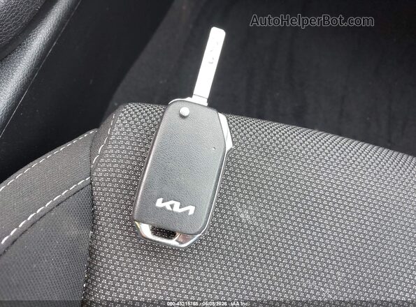 3KPF24AD9RE821101 2024 KIA FORTE White Vista del salpicadero