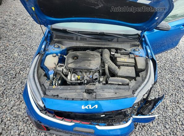 3KPF44AC0PE630312 2023 KIA FORTE Blue Rear interior view
