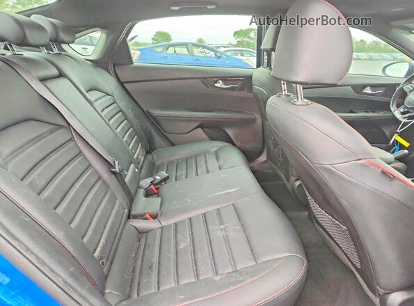 3KPF44AC0PE630312 2023 KIA FORTE Blue Rear seats view