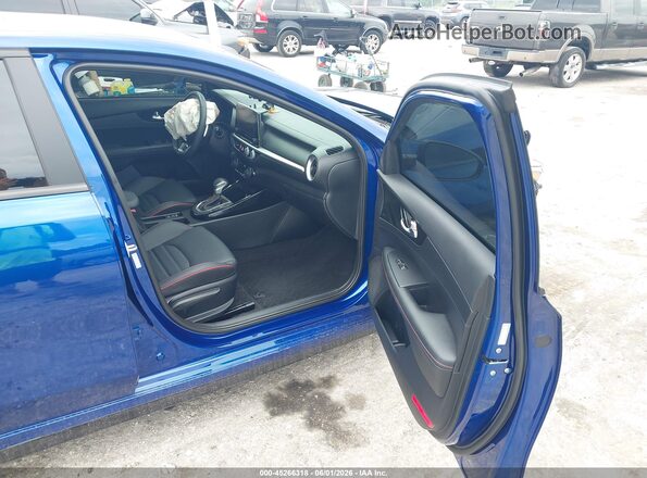3KPF44AC1RE772090 2024 KIA FORTE Blue Вид салону спереду