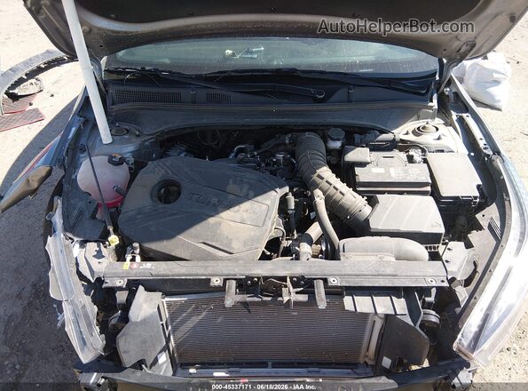 3KPF44AC2RE831017 2024 KIA FORTE Серебряный Вид сзади