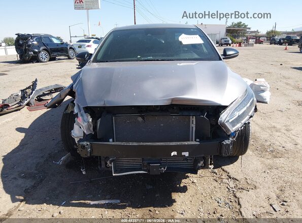 3KPF44AC2RE831017 2024 KIA FORTE Серебряный Вид задней части салона