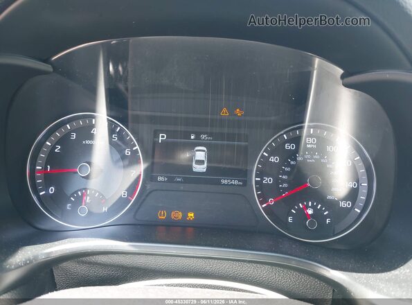 3KPF44AC9NE420725 2022 KIA FORTE Red Widok tylnych siedzeń