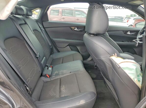 3KPF54AD3RE746208 2024 KIA FORTE Gray Rear seats view