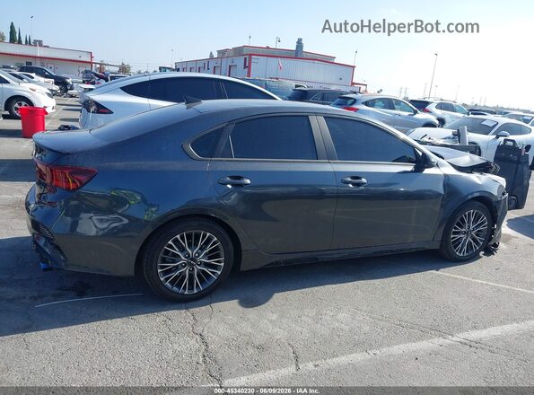 3KPF54AD4PE643215 2023 KIA FORTE Gray უკანა სალონის ხედი
