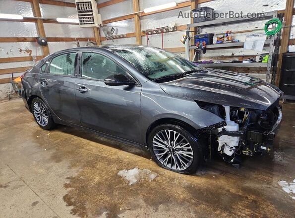 3KPF54AD4PE664954 2023 KIA FORTE Charcoal Front right
