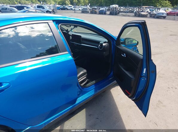 3KPF54AD5NE425944 2022 KIA FORTE Blue Widok wnętrza z przodu
