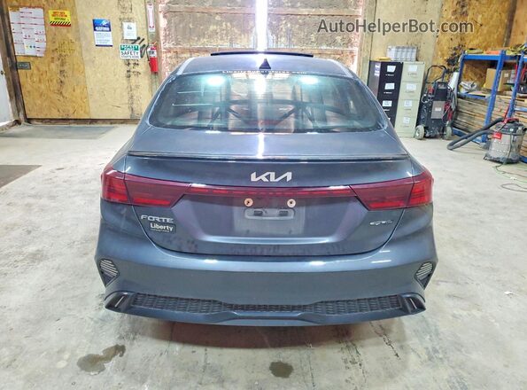 3KPF54AD5PE598270 2023 KIA FORTE Charcoal Rear view