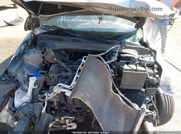 3KPF54AD5PE673033 2023 KIA FORTE Gray Вид ззаду