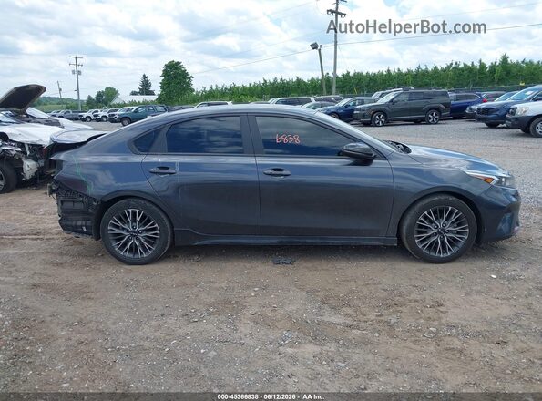 3KPF54AD7PE590915 2023 KIA FORTE Серый Вид задней части салона