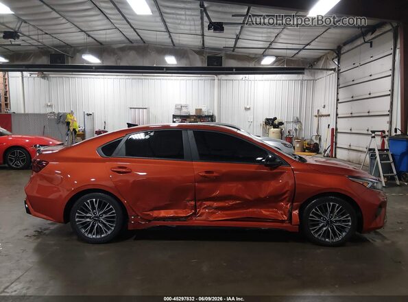 3KPF54AD7PE684969 2023 KIA FORTE Orange Rear interior view