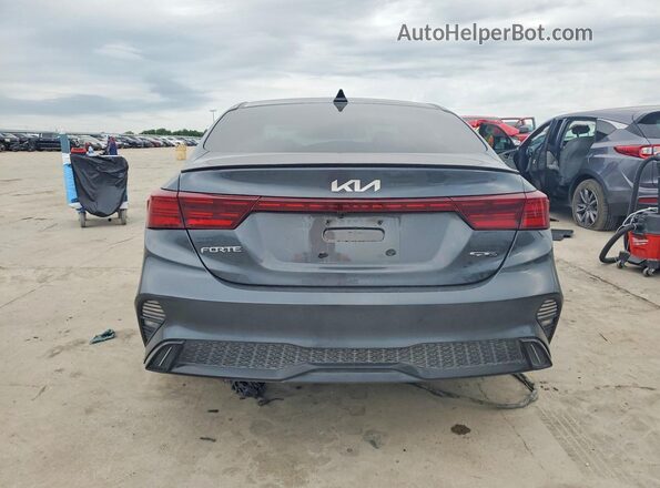 3KPF54AD9PE689283 2023 KIA FORTE Gray Rear view