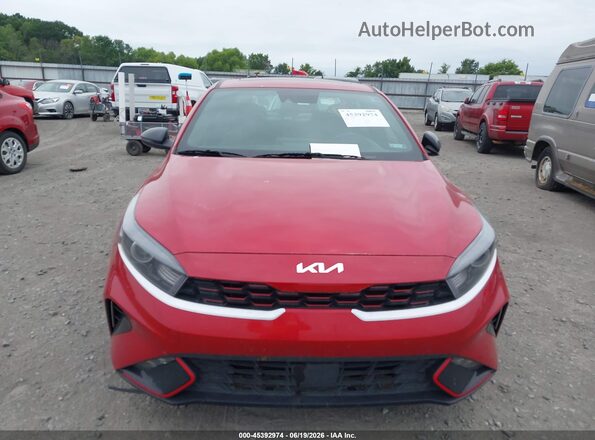 3KPF54AD9RE806427 2024 KIA FORTE Red Widok deski rozdzielczej